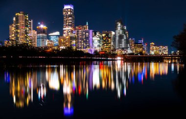 aerial shot modern city with skyscrapers in evening