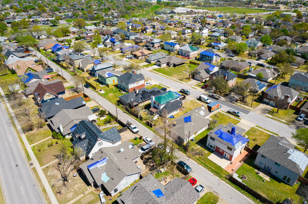 Aerial shot of small town with detached houses