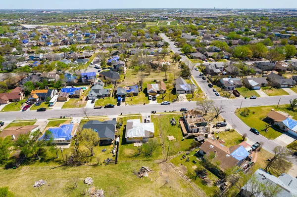 aerial shot of small town with detached houses