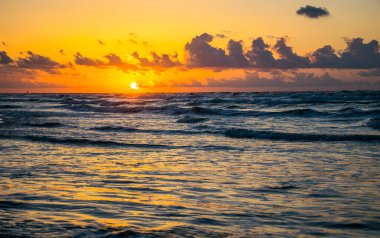  shot of beautiful seashore on sunset