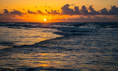 shot of beautiful seashore on sunset