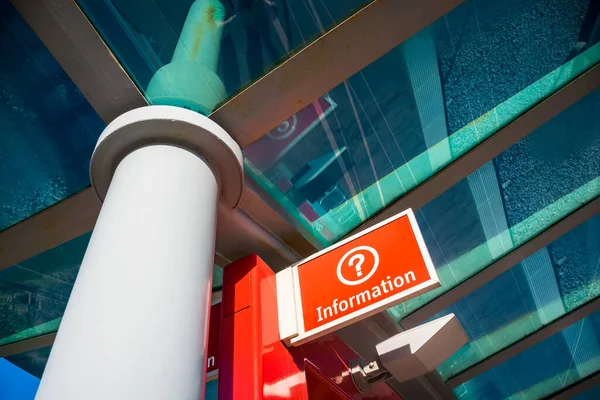 red and white information sign 