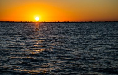  shot of beautiful seashore on sunset