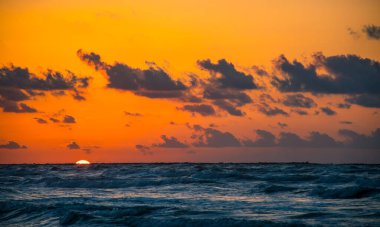  shot of beautiful seashore on sunset