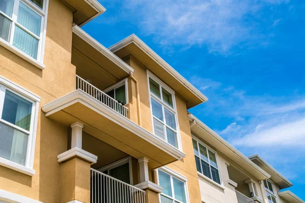 modern apartment buildings with blue sky