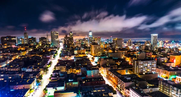 City lights glow at night in the Bay Area San Fran City  USA skyline cityscape nightscape