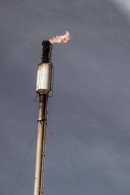 smoke stacks emitting carbon pollution into the sky causing climate change