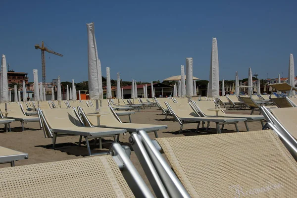 Detail Beach Loungers Empty Sandy Beach Showing Lack Tourists Missing — Stock Photo, Image