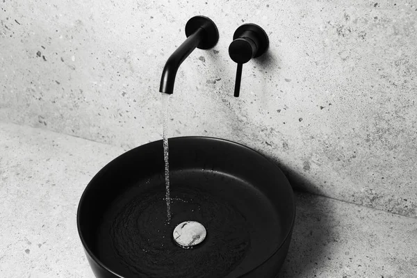 Close Black Sink Wall Mounted Faucet Flowing Water — Fotografia de Stock