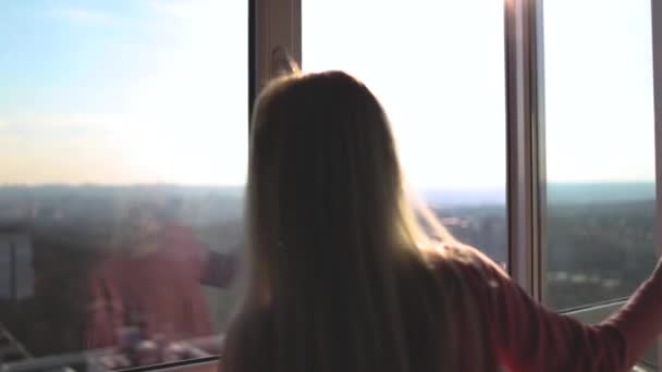 Back View Girl Opens Apartment Window Enjoying Beautiful Top View — Video Stock