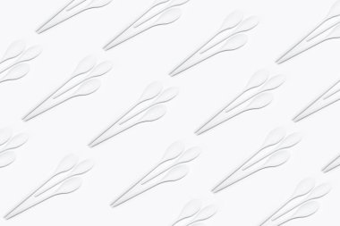 Beyaz arka planda izole edilmiş yemek pişirme için beyaz kaşık deseni.