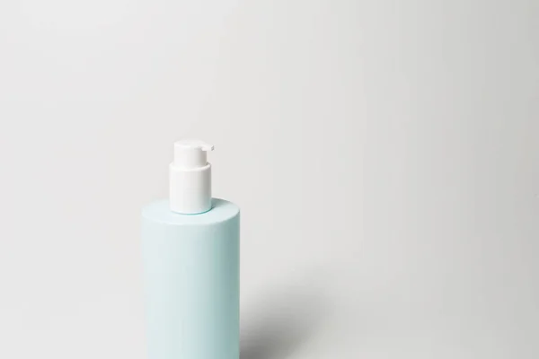 Close Dispenser Bottle Body Cream Cyan Color Isolated White Background — 스톡 사진