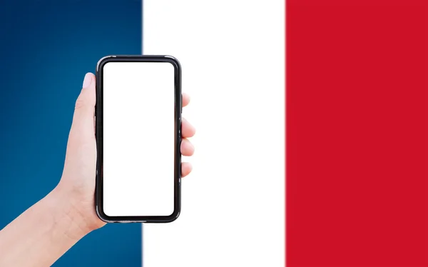 Close Male Hand Holding Smartphone Blank Screen Background Blurred Flag — Fotografia de Stock