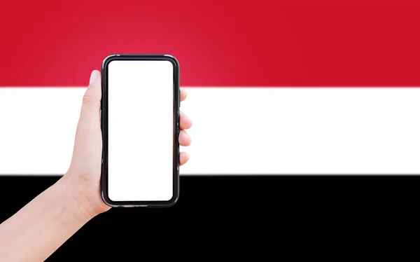 Close Male Hand Holding Smartphone Blank Screen Background Blurred Flag — Foto Stock