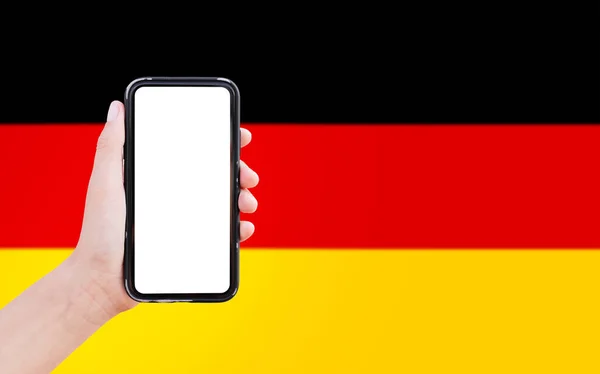 Close Male Hand Holding Smartphone Blank Screen Background Blurred Flag — Zdjęcie stockowe
