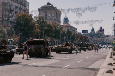 A parade of broken Russian military equipment in the city center on Khreshchatyk Street.