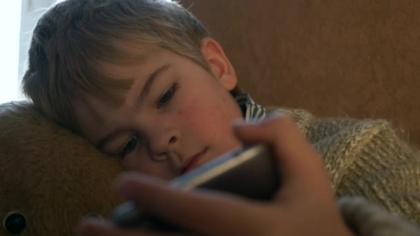 Lonely Boy Teddy Bear Watching Smartphone Internet Social Media Kid — Vídeos de Stock