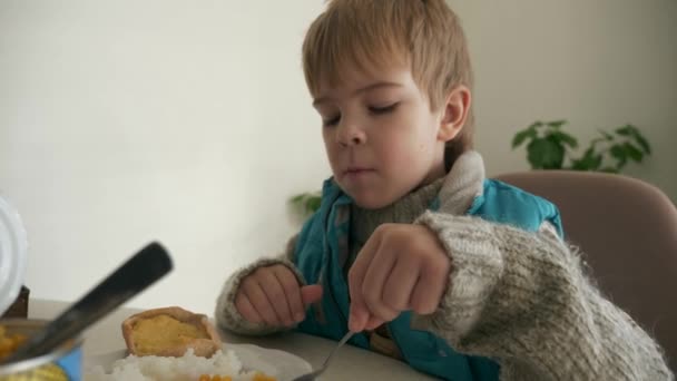 Child Eat Rice Canned Corn Kid Eating Meal Breakfast Dinner — Vídeo de Stock