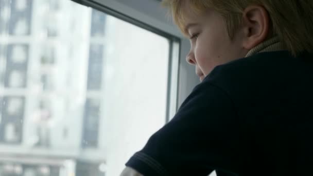 Little Kid Looking Out Window City Life Cute Child Boy — стокове відео