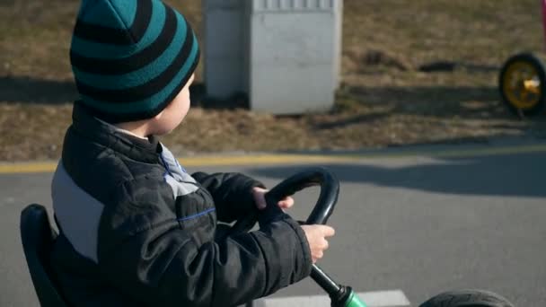 Kid Rides Pedal Cart Toy Car Happy Child Boy Rest — Vídeo de Stock