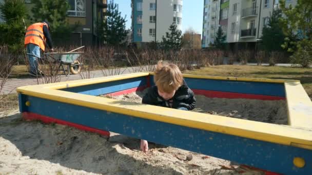 Kid Boy Plays Children Playground City Park Winter Spring Day — 图库视频影像