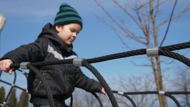 Kid Walks Climbs Children Playground Child Boy Plays Park City — Video Stock