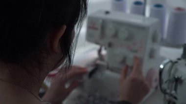 Woman Sew Working on Electric Sewing Machine. Female Seamstress Work at Home. Sunny Day. 2x Slow motion 60fps 4K