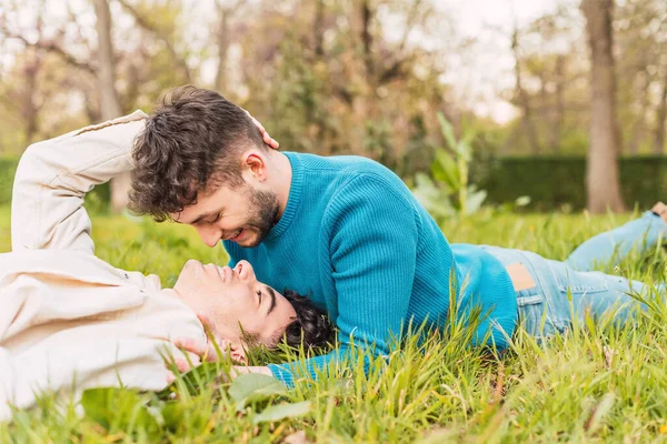 Side View Happy Homosexual Couple Males Lying Meadow Park Looking — Stock Photo, Image