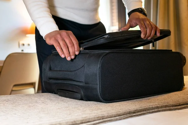 Crop Anonymous Male Traveler Opening Luggage Placed Bed Hotel Room — Stock Photo, Image