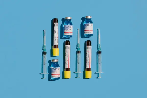 Coronavirus Negative Positive Blood Test Vaccine Flask Syringe Blue Background — Stock Photo, Image