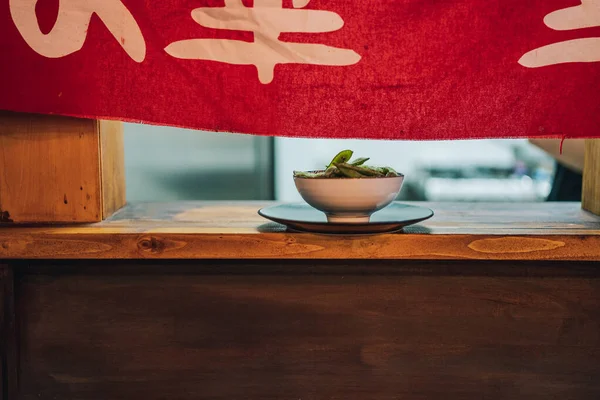 Traditional Asian Dish White Ceramic Bowl Wooden Window Restaurant — Stock Photo, Image