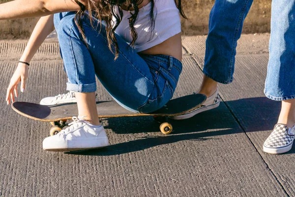 Crop Unrecognizable Female Siblings Casual Outfit Riding Skateboard Walkway While — Stock Photo, Image