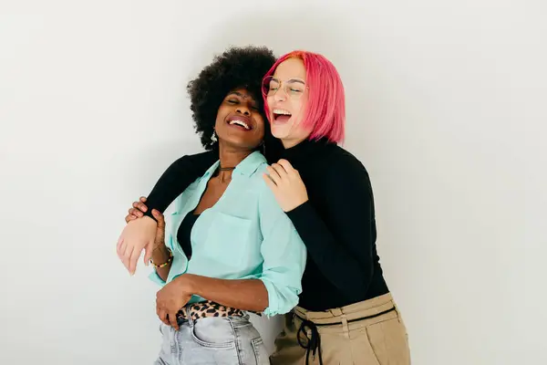 Cheerful Young Pink Haired Woman Embracing Positive African American Girlfriend — Stock Photo, Image