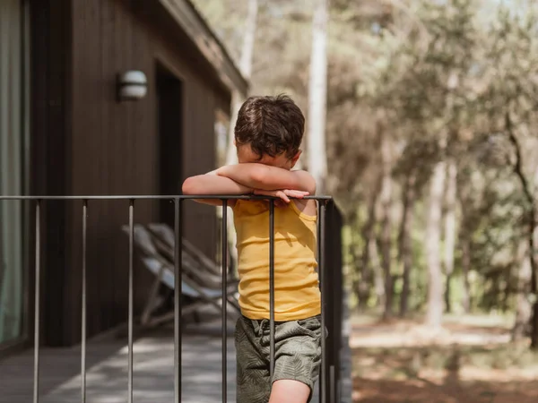 Lonely Offended Child Leaning Wooden Terrace House Forest Sunny Day — Stock Photo, Image