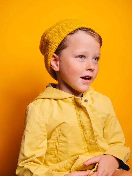 Amazed Little Boy Blue Eyes Bright Yellow Autumn Jacket Beanie — Stock Photo, Image