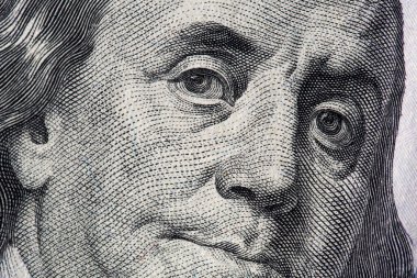 Dolar banknotlarının dokusu. Yüz dolar. Yakın çekim, makro.