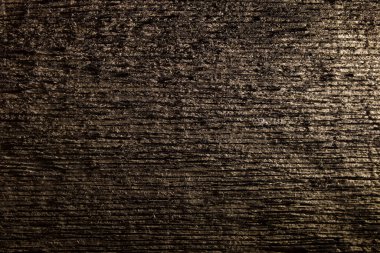 Yan ışıklandırması olan eski ahşap yakın plan. Tasarımcı için boşluklar.