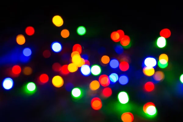 Onscherpe christmas lights feestelijke achtergrond. — Stockfoto