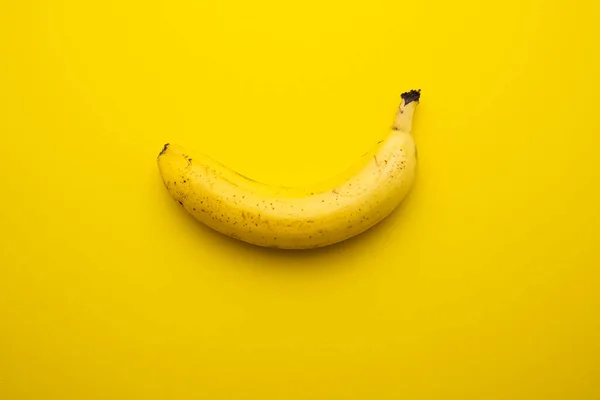 Sweet banana on the yellow background — Stock Photo, Image