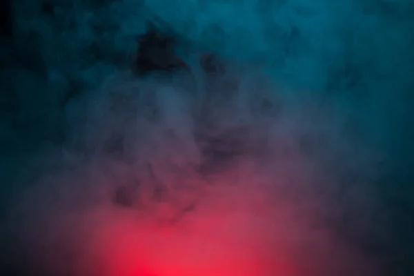Барвистий дим на чорному тлі — стокове фото