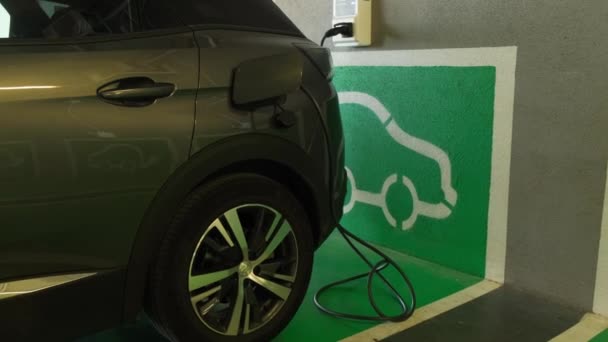 Tarragona, Spain - May 26, 2022: Car filling station close-up. Car charging in the parking lot. — Stock Video