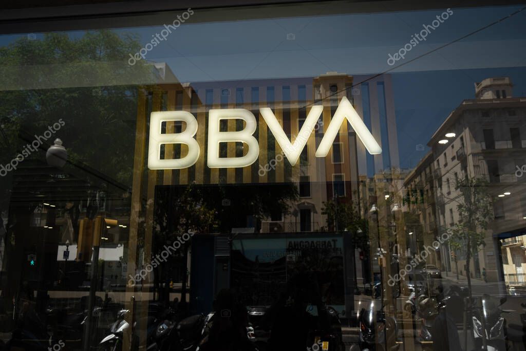 Tarragona, Spain - June 01, 2022: BBVA bank signage and entrance, Passeig de Gracia, Barcelona, Spain.
