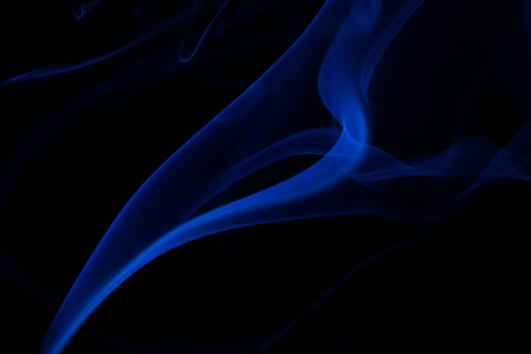 Colorful smoke close-up on a black background