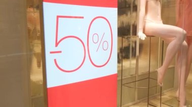 50 percent discount on lingerie shop window.