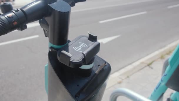Tarragona Spain June 2022 Scanning Code Smartphone Rent Electric Scooter — Vídeos de Stock