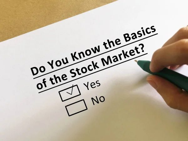 One person is answering question about economy. The person knows the basics of the stock market.