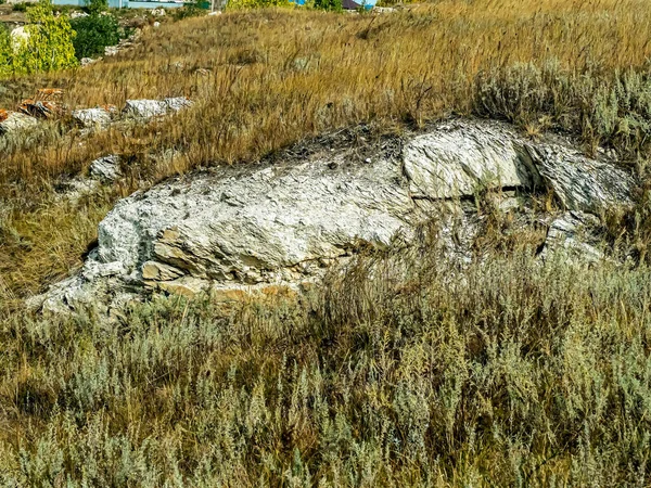 marble outcrops to the surface, the area of marble quarries in the village of Balandino, southern Urals, autumn