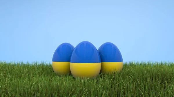 Tre ägg mot bakgrund av grönt gräs för semester i påsk i färgerna på den nationella flaggan i Ukraina 3D-rendering Stockfoto