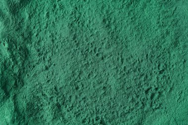 Yeşil spirulina alg tozundan yapılmış arkaplan, kopyalama alanı ile