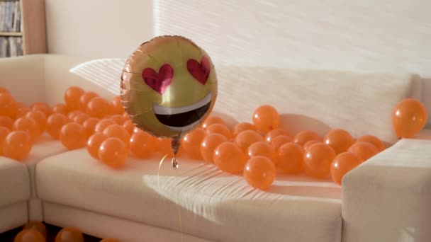Smiley Balloon Filled Helium Hovering Apartment Front Sofa Party — Stock Video